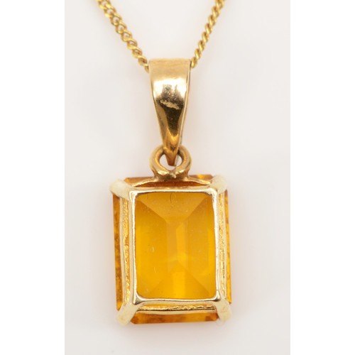 270 - A 14k gold emerald cut citrine pendant, on 375 gold chain, 16mm, together with a matching pair of un... 