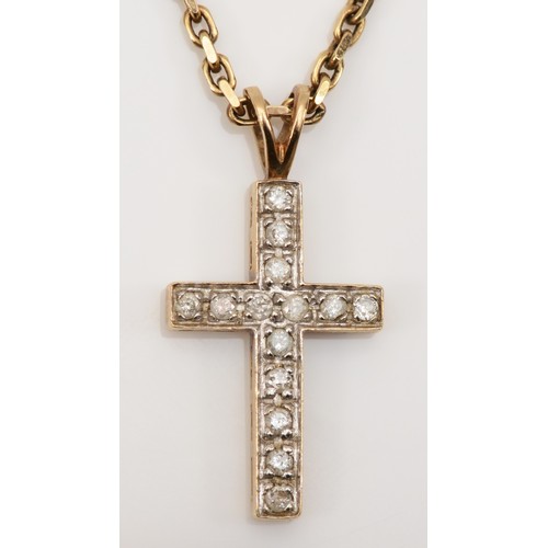 271 - A 9ct gold brilliant cut diamond cross pendant, on 9k gold chain, 23 x 11mm, 5.4gm.