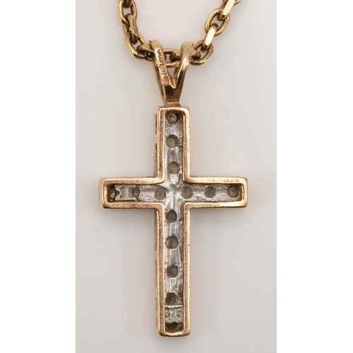 271 - A 9ct gold brilliant cut diamond cross pendant, on 9k gold chain, 23 x 11mm, 5.4gm.