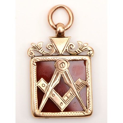 279 - Masonic interest, a 9ct gold chalcedony masonic pendant, Birmingham 1942, 16 x 25mm, 3gm.