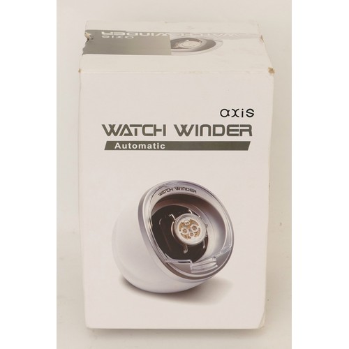 64 - Axis electric automatic watch winder, boxed.