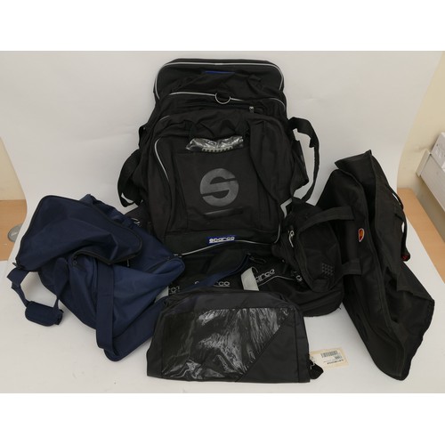 143 - Travel bags to include, two Sparco, large, black, used but good condition. One Ellesse black bag. On... 