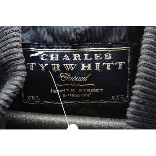 148 - Charles Tyrwhit, Two in one black waistcoat with navy wax coat. Waistcoat zips into coat for added w... 