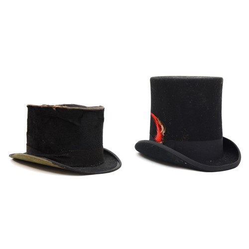 164 - A vintage Christy's of London, silk and leather interior, black top hat in need of restoration, 60cm... 