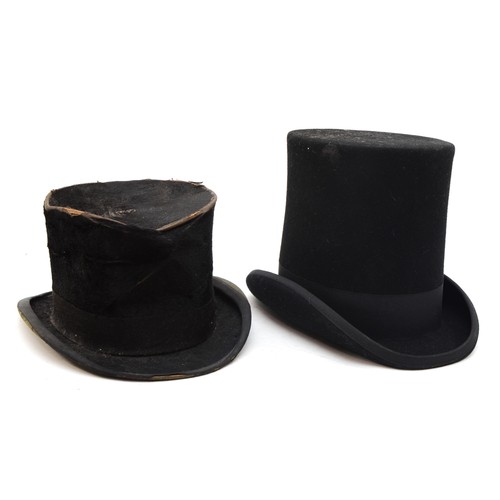 164 - A vintage Christy's of London, silk and leather interior, black top hat in need of restoration, 60cm... 