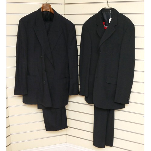 217 - Two navy suits to include:
Alexandre of London, slight check pattern, good used condition, Jacket 48... 