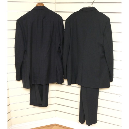 217 - Two navy suits to include:
Alexandre of London, slight check pattern, good used condition, Jacket 48... 