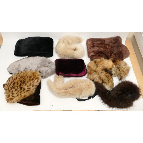 261 - Real and faux fur collars and stoles. To include a black faux fur stole 122 x 18 cm, a burgundy faux... 