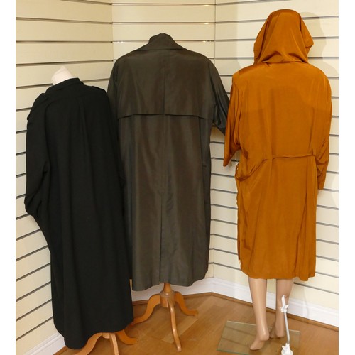 268 - A vintage 'Model depose' Paris design, gold coloured long length lightweight jacket, draw pull hood ... 