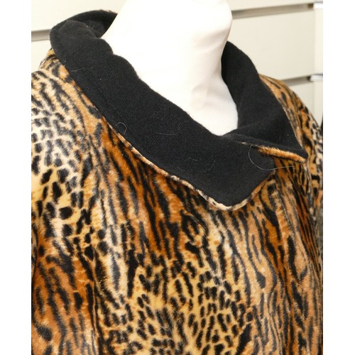 281 - Reversible faux fur leopard print, high collar gilet with black wool option, chest 62cm/L80cm. Toget... 