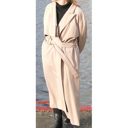 Mansfield, pure new wool duster coat, no buttons, side concealed pockets, lined, coral coloured, size 16. Together with a camel coloured trench coat, made in Hungary, pure new wool, lined, back button vent, cape detail and side pockets, size medium. (2)