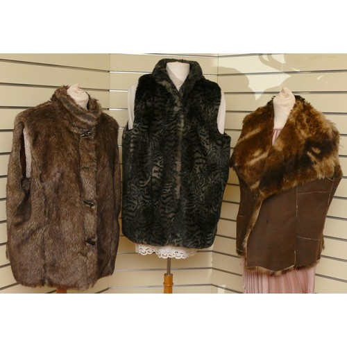 316 - Isle lined faux fur brown gilet, toggle fastening, extra large/L 66cm, together with a Per Una suede... 