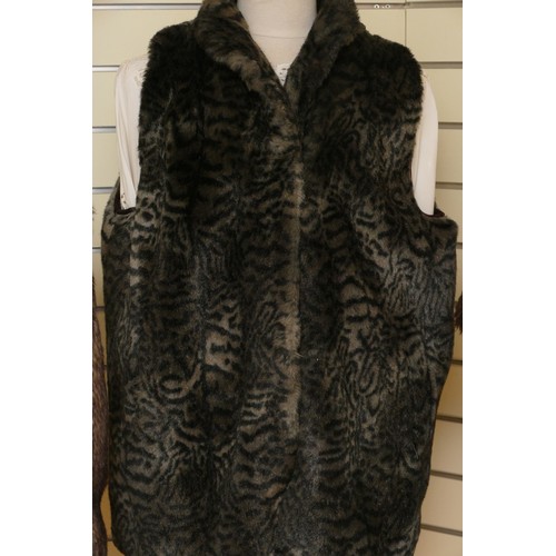 316 - Isle lined faux fur brown gilet, toggle fastening, extra large/L 66cm, together with a Per Una suede... 