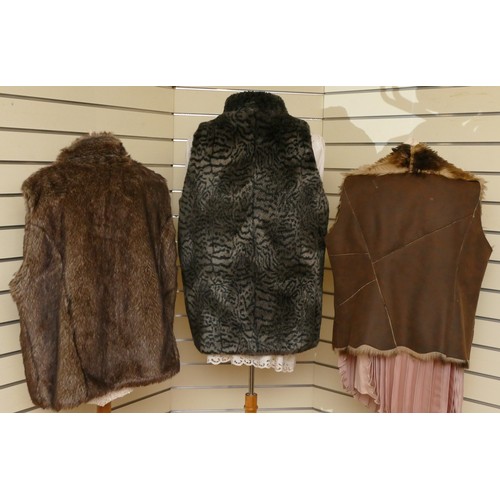 316 - Isle lined faux fur brown gilet, toggle fastening, extra large/L 66cm, together with a Per Una suede... 