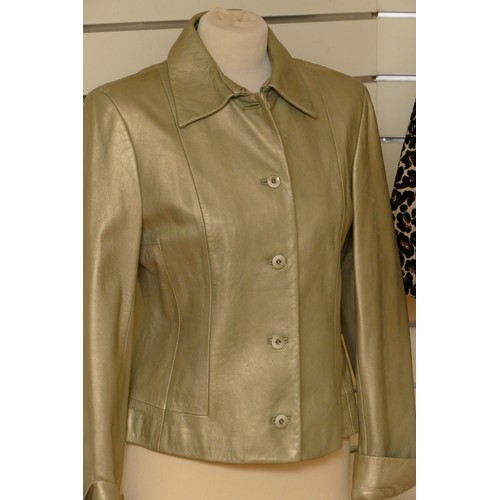 326 - Episode - gold leather jacket, button front, long sleeves, lined size 12 with an animal print, unbra... 