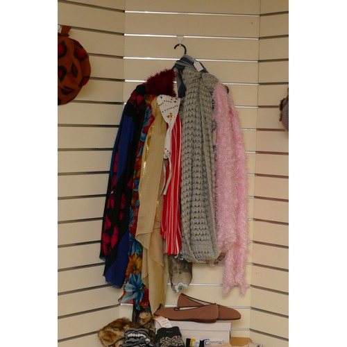 334 - A selection of ladies accessories, to include scarves, belts and hats and socks.