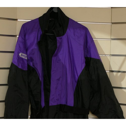 335 - Shoei Waterproof over suit, purple/black, size medium, zip and velcro fastenings, no signs of wear.