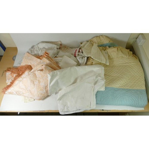 336 - A quantity of linens to include bed spreads, roller towels, tablecloths, napkins and other items.