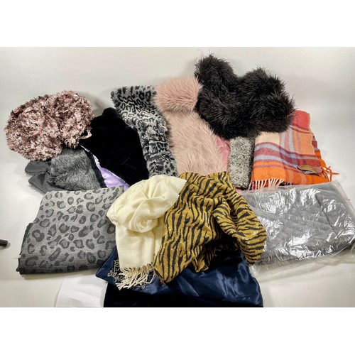 346 - A quantity of scarves to include faux fur stoles, pashmina style shawls, winter and evening scarves.... 