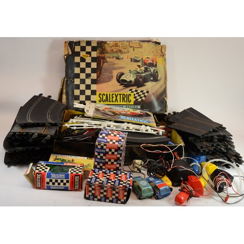 A large collection of Scalextric model motor racing parts and