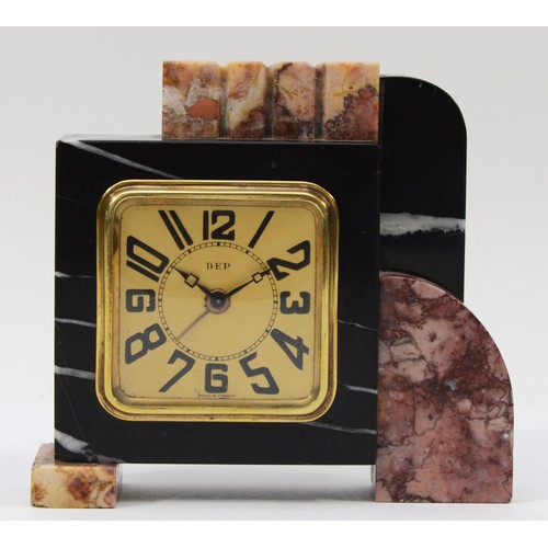 A 1920s French Art Deco marble mantel/desk alarm clock, having 8 day movement the case stamped Made In France, 11x12.5 cm.