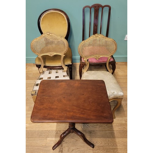 284 - An Edwardian mahogany tilt top side table, having turned central column on a trypod base, height 68c... 