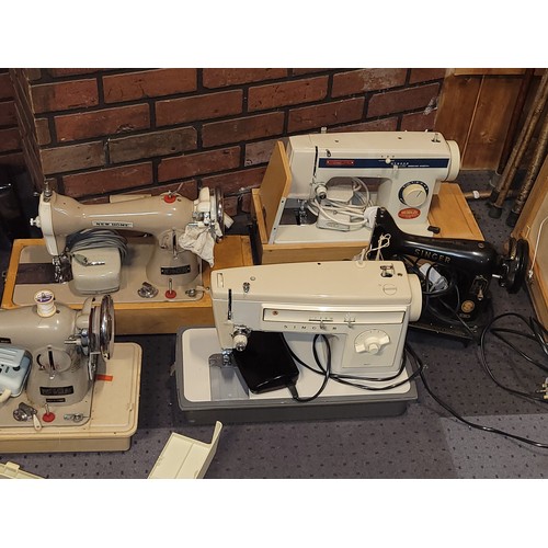 56 - Ten 20th century assorted electric cased sewing machines (10)