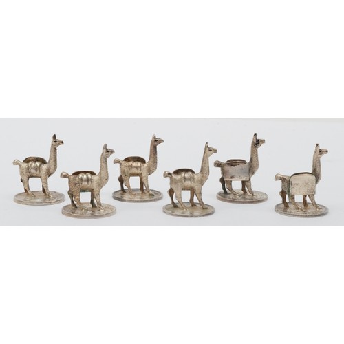 10 - An unusual set of six Bolivian cast silver lama menu/place name holders, raised on 1882 - 1900 silve... 