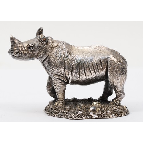 37 - A silver rhinoceros paperweight, by Country Artists, Birmingham 1992, loaded, 6 x 8.5 cm.