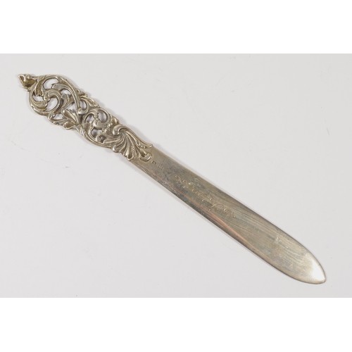 74 - A Scandinavian 830 silver letter opener, with cast floral handle, inscribed Island20cm, 51gm