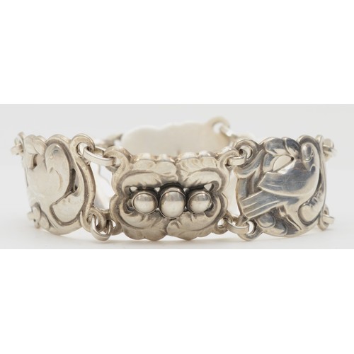 116 - K. Mohl Hansen for Georg Jensen, a silver 6 link bracelet with dove and foliage motifs with silver p... 