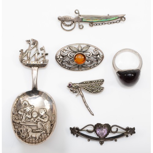 128 - Four Edwardian hallmarked silver brooches, and a ladies hallmarked silver ring, size P, together wit... 