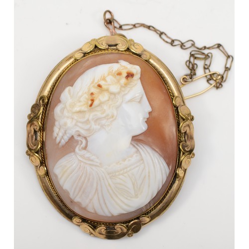 135 - A Victorian gold plated carved shell cameo, depicting a classical maiden, 50 x 40mm.