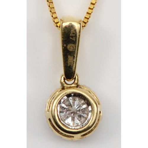 139 - A 10k gold brilliant cut diamond pendant, surrounded by smaller eight cut diamonds, central stone ap... 