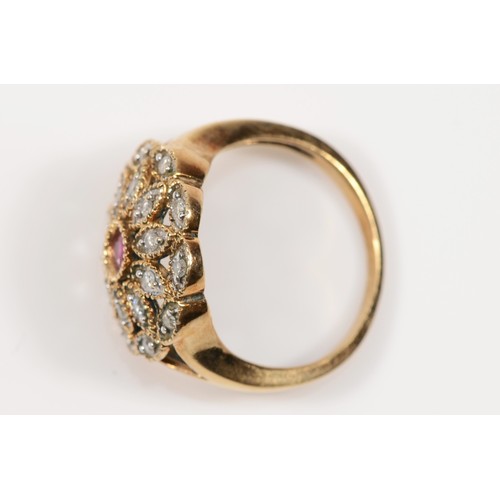 154 - A vintage gold ruby and brilliant cut diamond floral dress ring, P-Q, unmarked, 3.8gm.