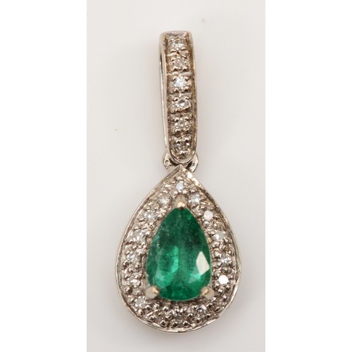 156 - An 18k white gold pear cut emerald and diamond pendant, 22 x 9mm, 1.8gm.