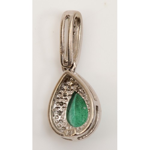 156 - An 18k white gold pear cut emerald and diamond pendant, 22 x 9mm, 1.8gm.