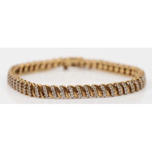 160 - A vintage 9ct gold eight cut diamond bracelet, four rows of diamonds to each section, approximately ... 