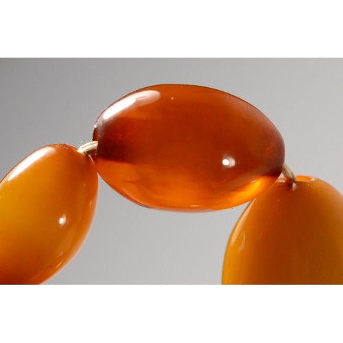 166 - A butterscotch amber Bakelite graduated bead necklace, 28 - 11mm beads, 50cm, 46gm