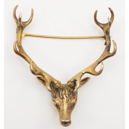 176 - A Victorian silver gilt twelve point stag head brooch, by Ferguson & McBean, Inverness, 55 x 65mm, 2... 