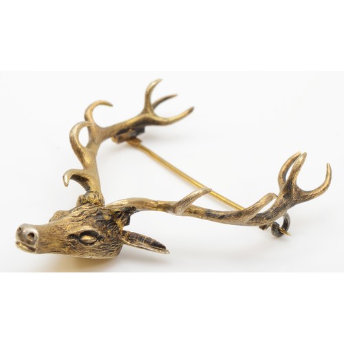 176 - A Victorian silver gilt twelve point stag head brooch, by Ferguson & McBean, Inverness, 55 x 65mm, 2... 