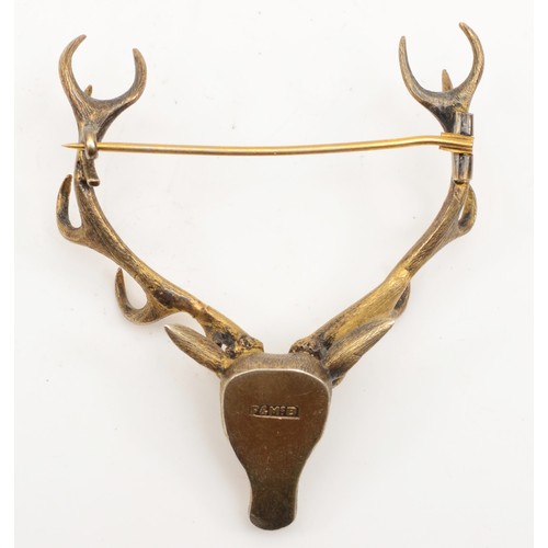 176 - A Victorian silver gilt twelve point stag head brooch, by Ferguson & McBean, Inverness, 55 x 65mm, 2... 