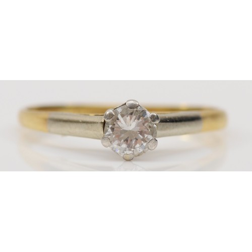 179 - An 18ct gold and platinum set single stone brilliant cut diamond solitaire ring, M, 1.5gm.