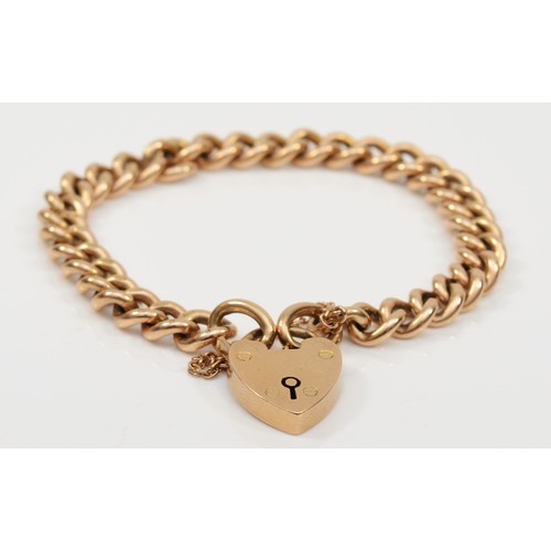 181 - A 9ct gold heart shaped padlock bracelet, approximately 16cm, 36gm in original R.Curtis, Hull box.