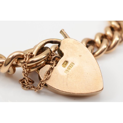 181 - A 9ct gold heart shaped padlock bracelet, approximately 16cm, 36gm in original R.Curtis, Hull box.