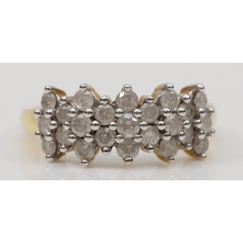 183 - A 9ct gold brilliant cut diamond cluster ring, O, 3.4gm.