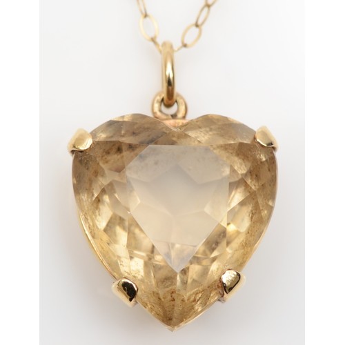 189 - A Scottish 9ct gold and citrine heart shape pendant, Edinburgh 1965, 15 x 14mm, later 9ct chain