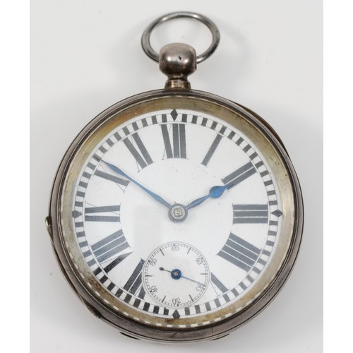 202 - A Swiss 935 silver open face key wind pocket watch, large Roman numerals, 53mm.
Working when catalog... 