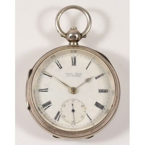 205 - An Edwardian silver key wind open face pocket watch, retailed by Pack Bros, Tiverton, Chester 1904, ... 