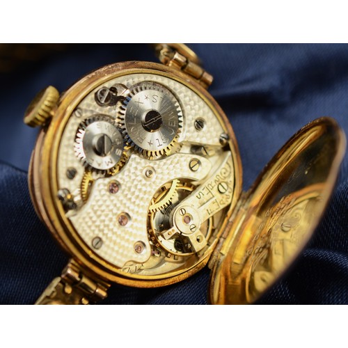 212 - A ladies 9ct gold Rolex bracelet watch, c.1910, 26mm diameter, a silvered guilloché dial with Arabic... 